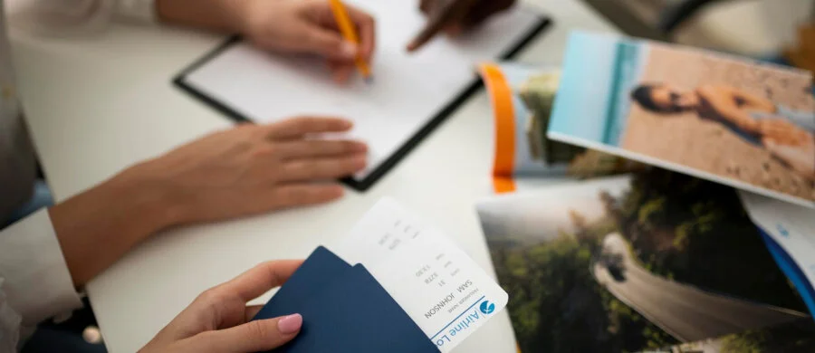 Traveler arriving in the UAE with a Dubai residence visa in front of an airport terminal